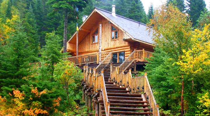 An outfitter's cottage with a large staircase.