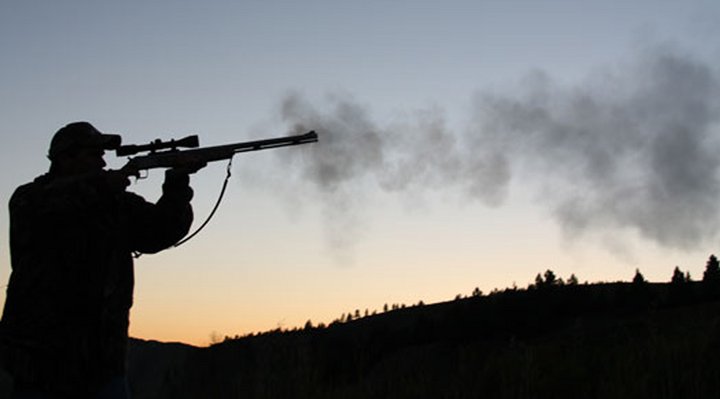 A hunter with a black powder rifle.