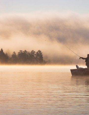Two fishermen at sunrise