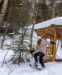 A couple snowshoeing at an outfitter