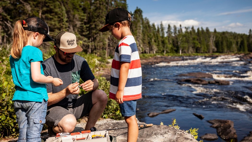 A father who introduces his children to fishing
