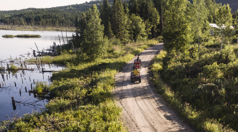 Aerial view on quad in a trail.