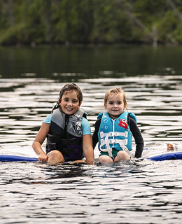 Two girls playing in water.