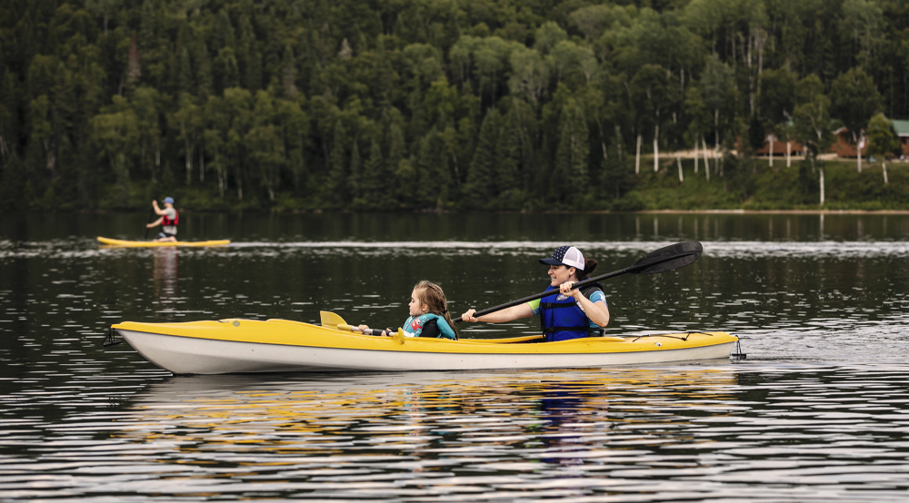 A mother and daughter in a kayak