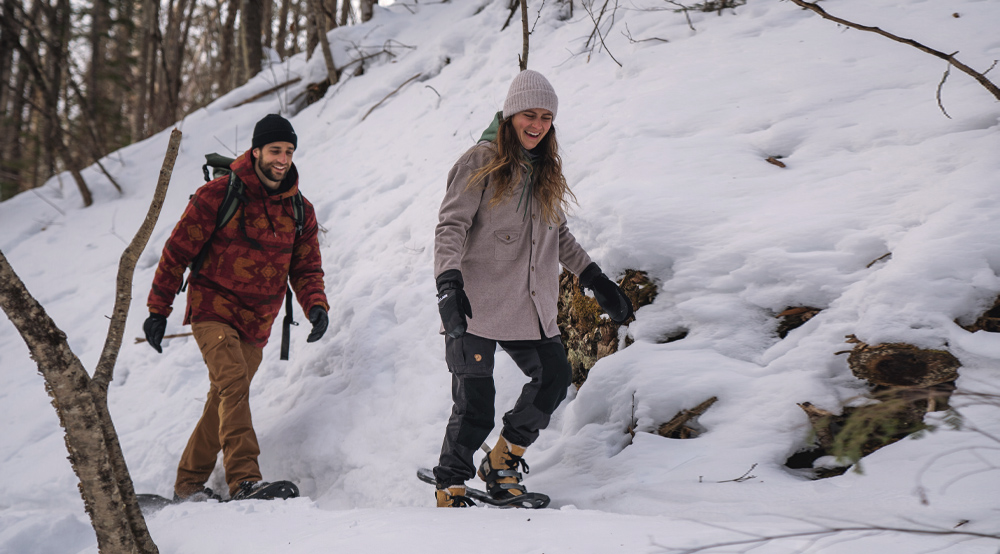 A snowshoeing couple