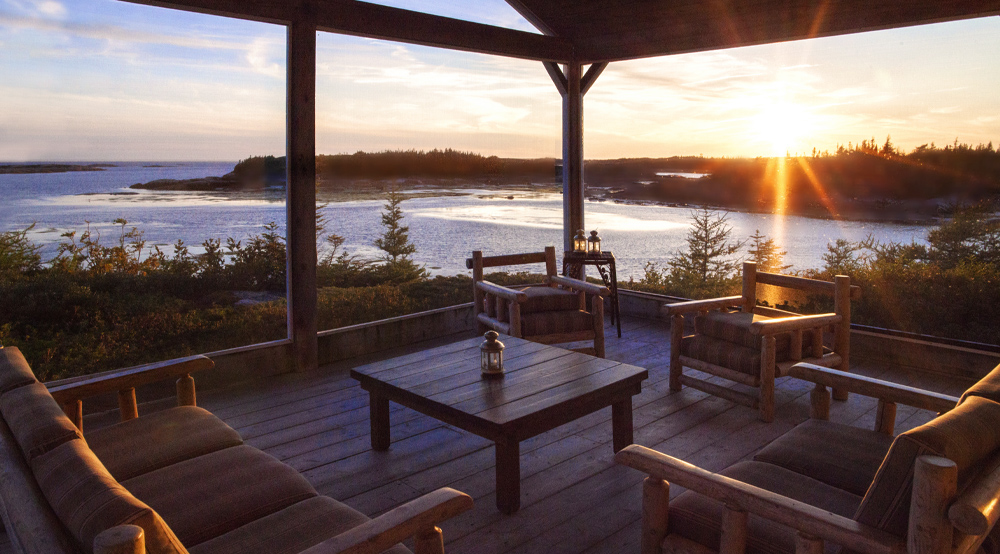 A terrace with a sunset view